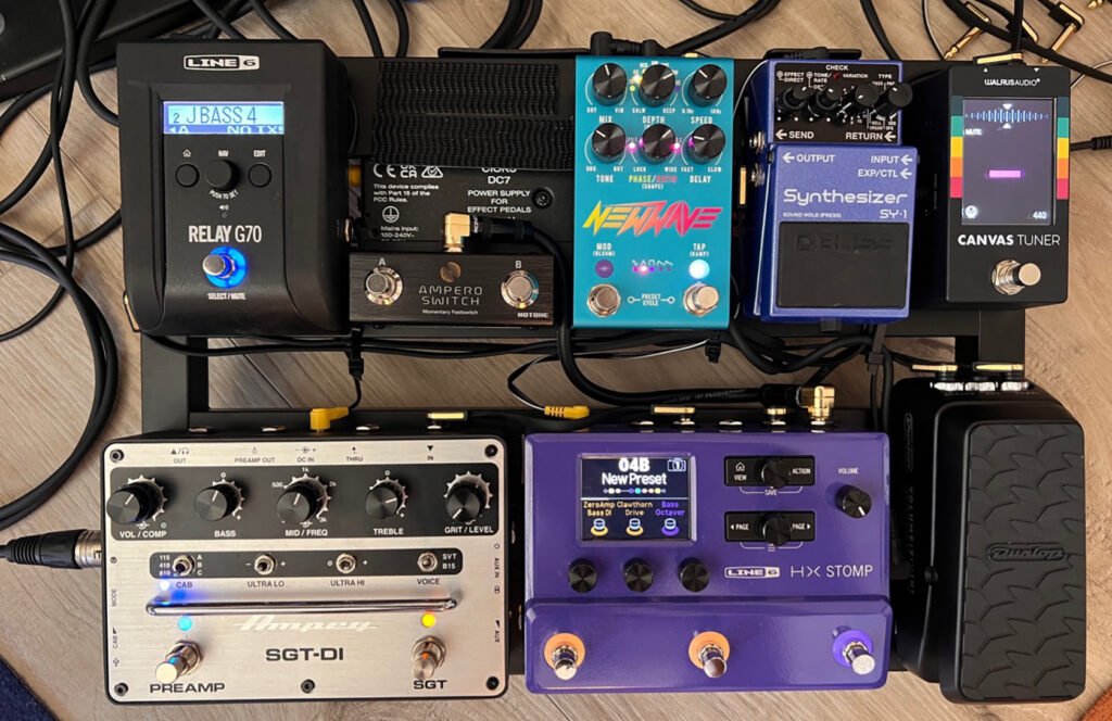 Dom Liberati pedalboard with Line 6 Relay G70, Ampero Switch, NewWave, Bass Synthesizer SY-1, Walrus Audio Canvas Tuner, Ampeg SGT-DI, Line 6 HX Stomp, Dunlop expression pedal